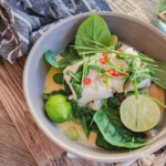 Steamed cod with spinach and lime